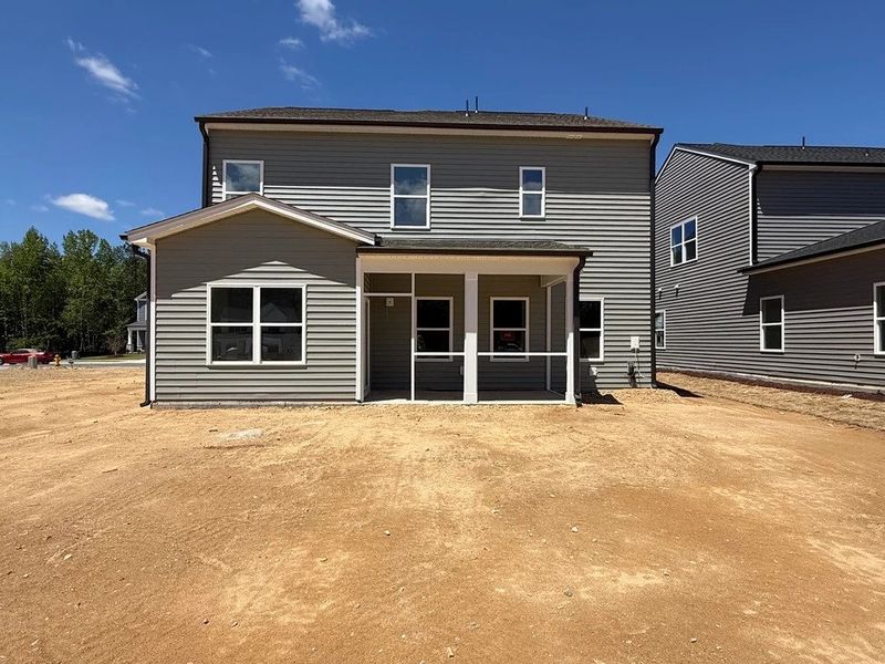Exterior details and patio area of a home in The Point, Rolesville (Image 3).