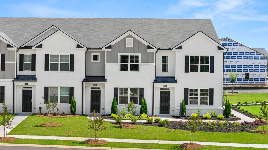 Front exterior of a new home in Echo Glen, Stockbridge, GA, highlighting curb appeal (Image 1). Front exterior of a new home in Echo Glen, Stockbridge, GA, highlighting curb appeal (Image 1).
