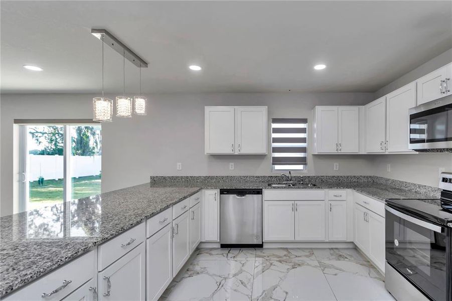 Furnished interior view inside a new home in Diamond Ridge, Belleview (Image 9).