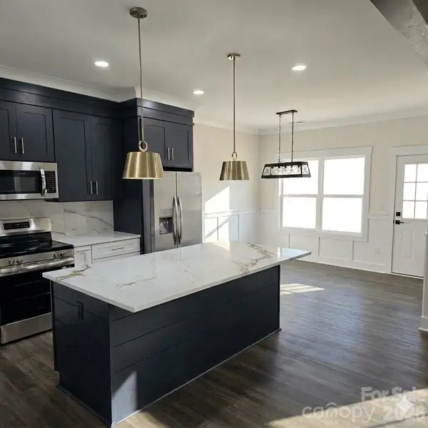 Furnished interior view inside a new home in , Concord (Image 4).