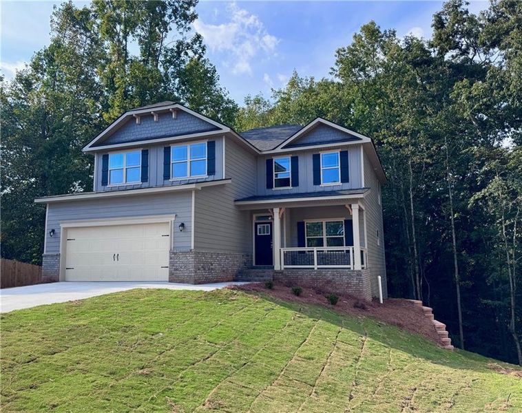 Front exterior of a new home in Magnolia Villas, Cornelia, GA, highlighting curb appeal (Image 18). Front exterior of a new home in Magnolia Villas, Cornelia, GA, highlighting curb appeal (Image 18).