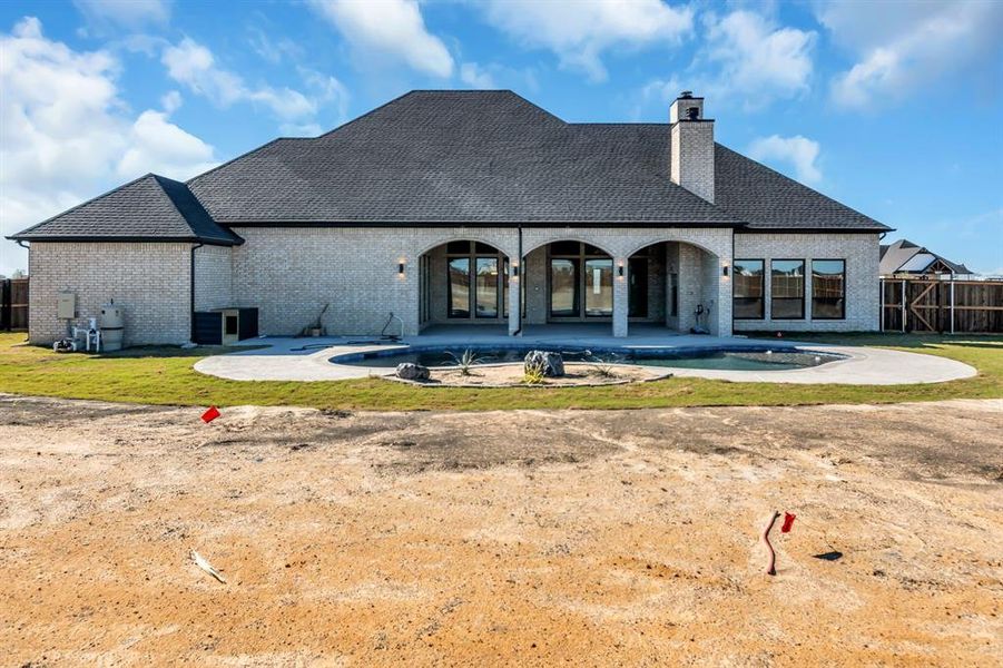 Exterior details and patio area of a home in , Venus (Image 3).