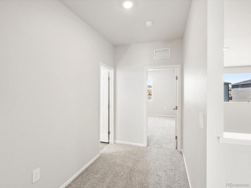 Spacious, unfurnished interior of a new home in Poudre Heights: The Alpine Collection, Windsor (Image 19).