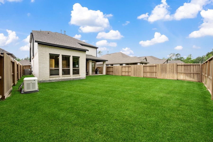Exterior details and patio area of a home in The Highlands, Porter (Image 4).
