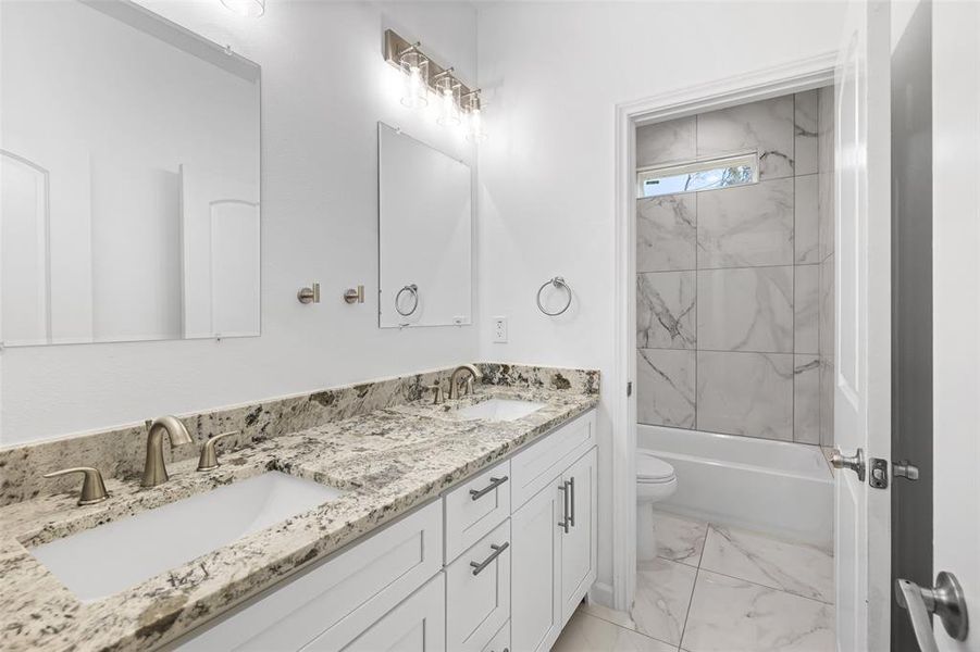 Nice Bath With Dual Sinks, Granite Counters & Beautiful 
Tiled Tub/Shower