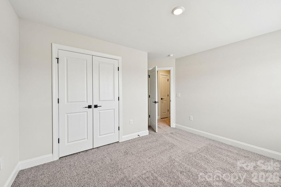 Spacious, unfurnished interior of a new home in Colonial Crossing, Troutman (Image 23).