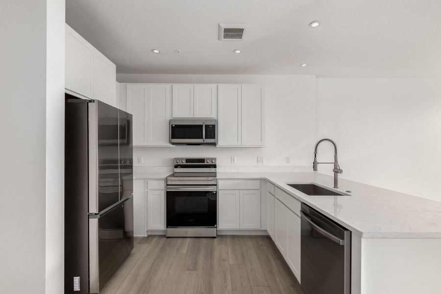 Furnished interior view inside a new home in The Scene at Sloan's Lake, Denver (Image 4).