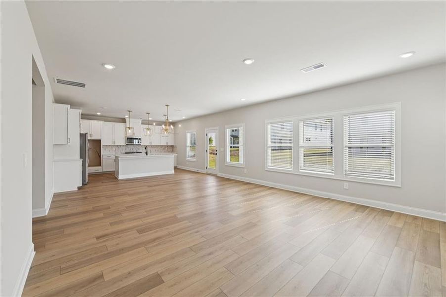 Spacious, unfurnished interior of a new home in Vines at Mill Creek - Estate Series, Braselton (Image 50).