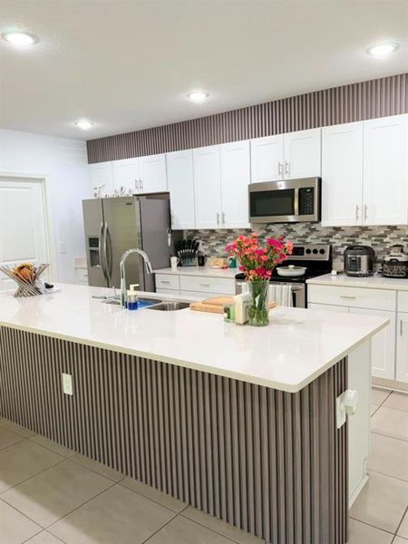 Furnished interior view inside a new home in , Kissimmee (Image 11).