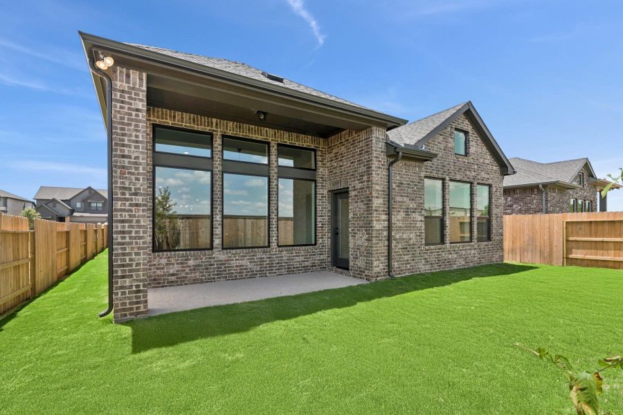 Front exterior of a new home in Grange 45' Homesites, Katy, TX, highlighting curb appeal (Image 12). Front exterior of a new home in Grange 45' Homesites, Katy, TX, highlighting curb appeal (Image 12).