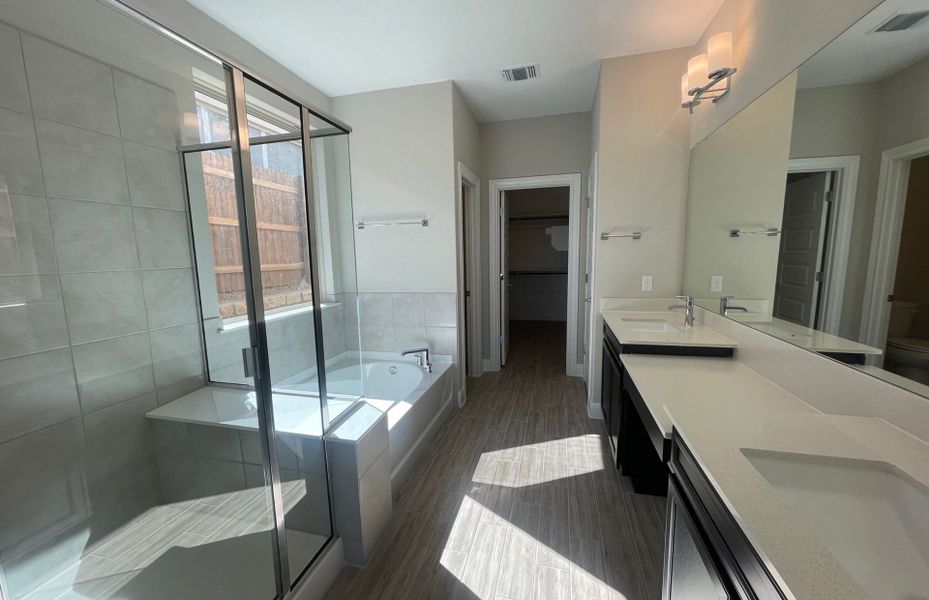 Owner's Suite with Double Vanity and Walk-In Shower