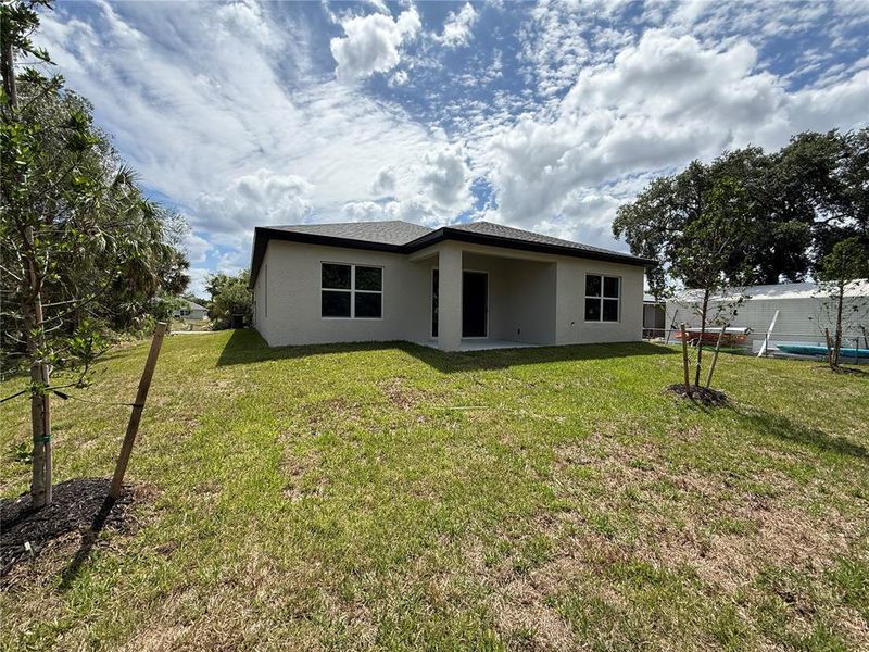 Exterior details and patio area of a home in , Port Charlotte (Image 16).