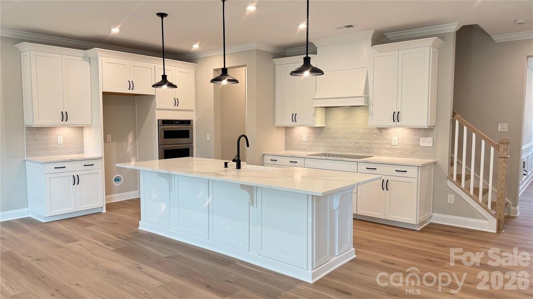 Furnished interior view inside a new home in The Townes at Wade Ardrey, Charlotte (Image 14).