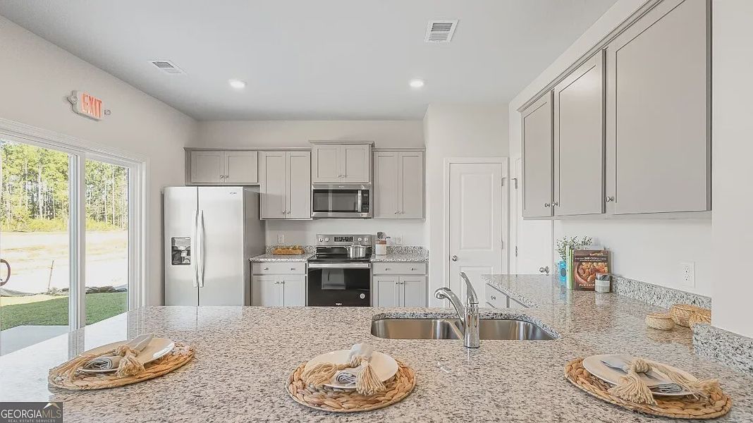 Furnished interior view inside a new home in Sherwood Manor, College Park (Image 7). Furnished interior view inside a new home in Sherwood Manor, College Park (Image 7).