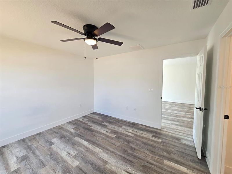 Spacious, unfurnished interior of a new home in , Port Charlotte (Image 24).