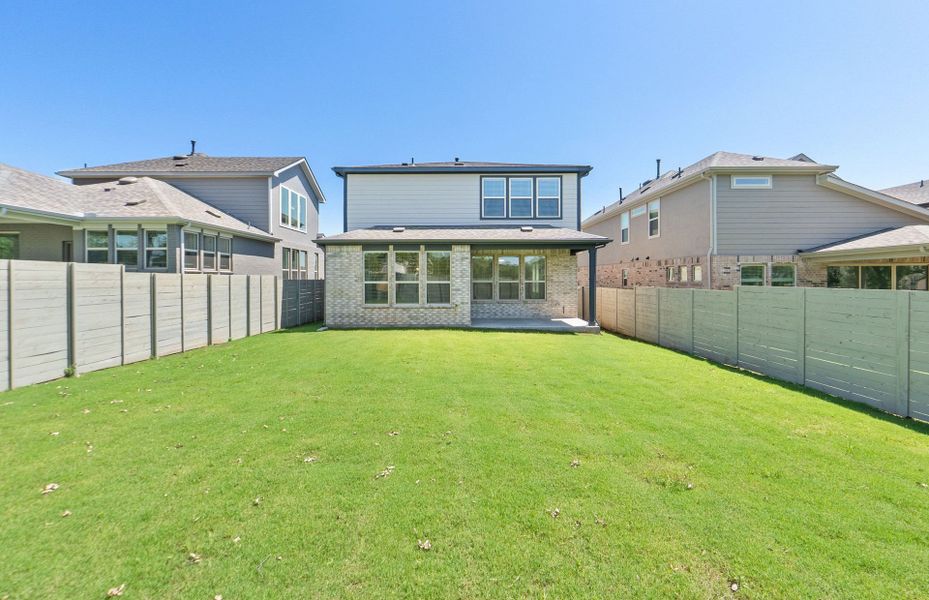 Exterior details and patio area of a home in Wolf Ranch, Georgetown (Image 31).