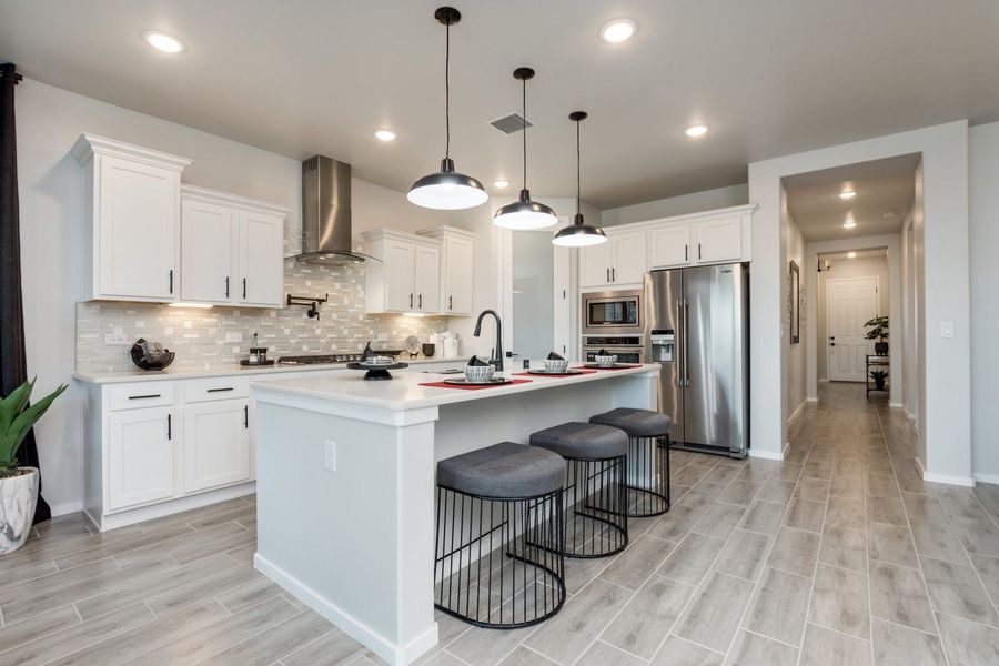 Representative furnished interior of a home built from the Santa Rosa by Hakes Brothers in Paseo Del Este, El Paso (Image 5).