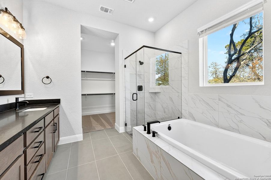 Furnished interior view inside a new home in Davis Ranch 60', San Antonio (Image 11).