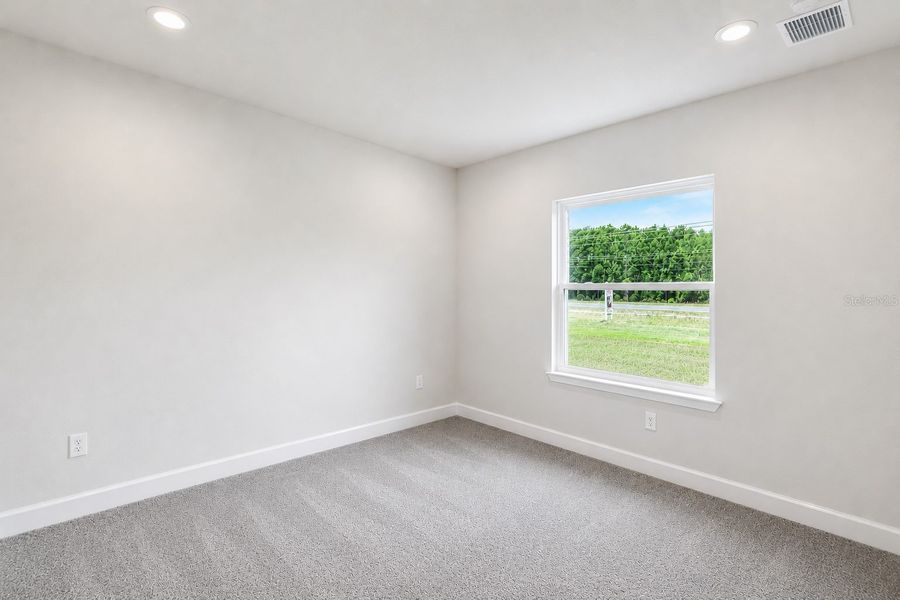 Spacious, unfurnished interior of a new home in Harmony Central, St. Cloud (Image 15).