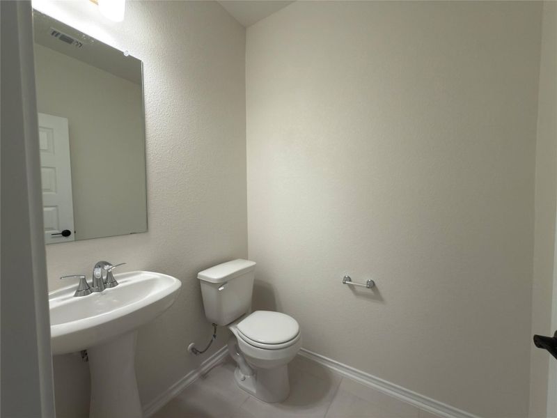 Furnished interior view inside a new home in River Bluff, Leander (Image 13).