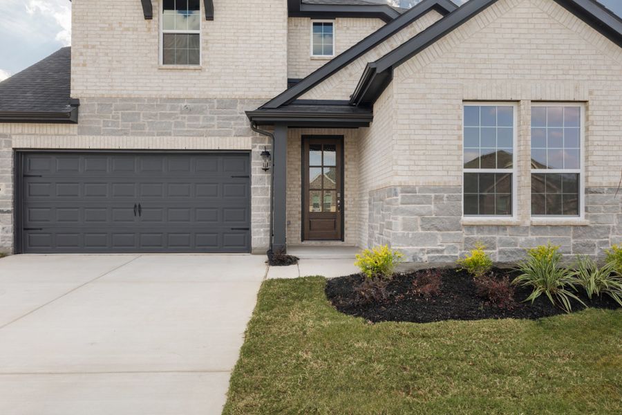 Exterior details and patio area of a home in Walden Pond, Forney (Image 3).