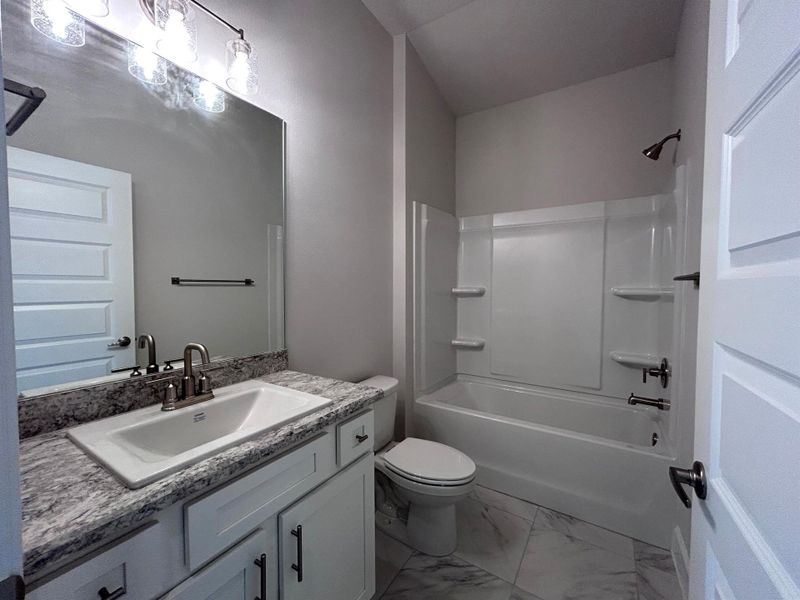 Furnished interior view inside a new home in Waterstone 72, Fort Pierce (Image 6). Furnished interior view inside a new home in Waterstone 72, Fort Pierce (Image 6).