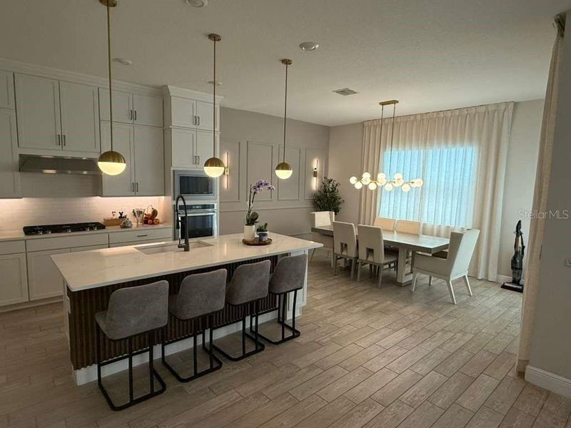 Furnished interior view inside a new home in Parkview Reserve, Orlando (Image 46).