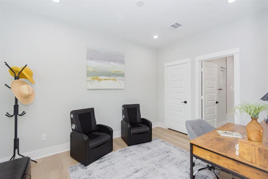 This secondary bedroom features its ensuite bathroom and walk-in closet.