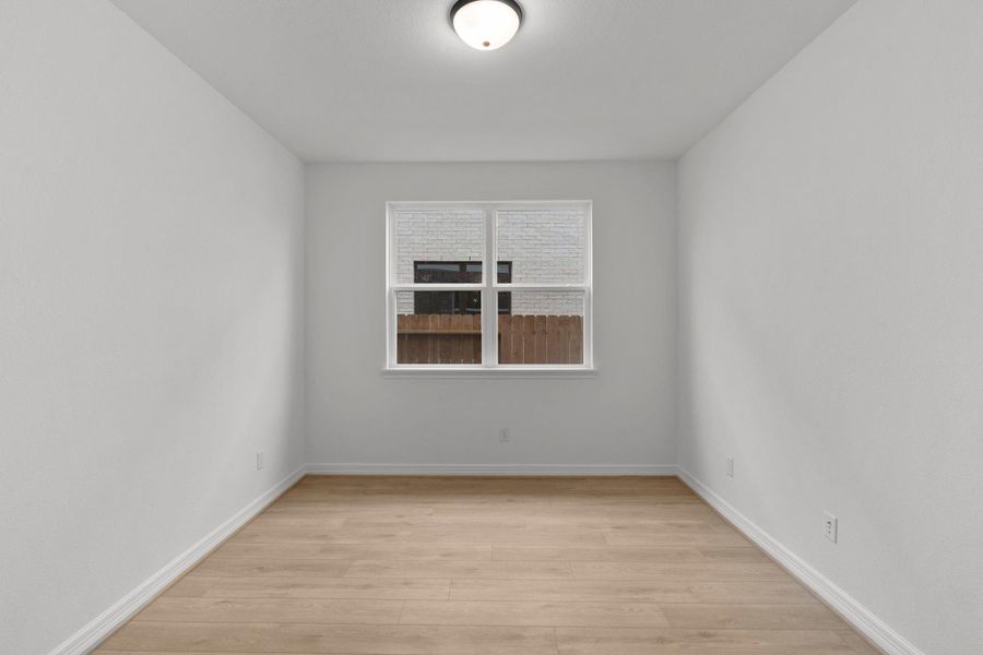 The home office features French doors, beautiful floors, large windows that give a fresh feel, this space promotes focus and creativity.