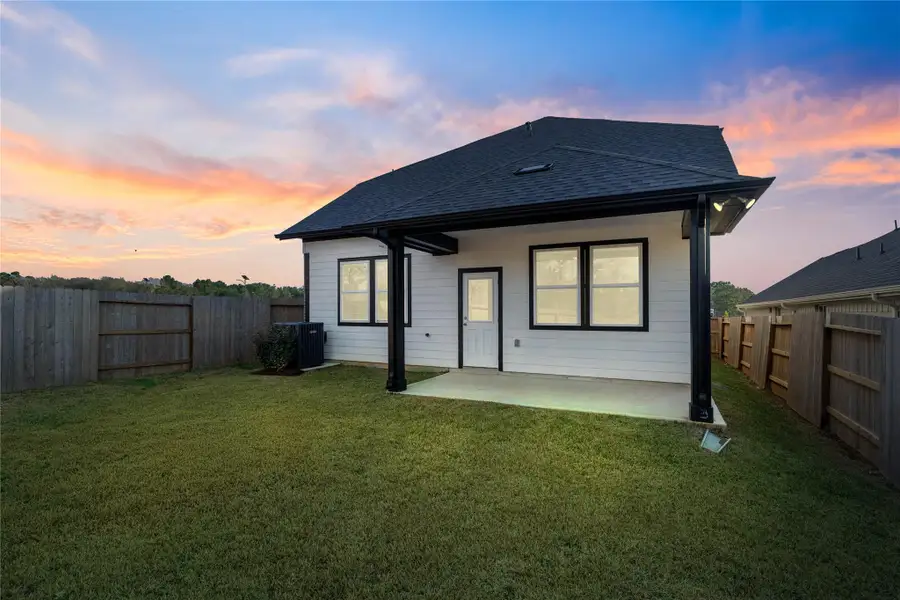 Enjoy the outdoors! A covered patio that offers the perfect space for entertaining guests or relaxing.