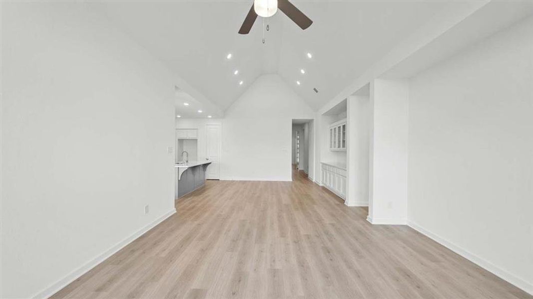 Family to Dining room with Vaulted ceilings