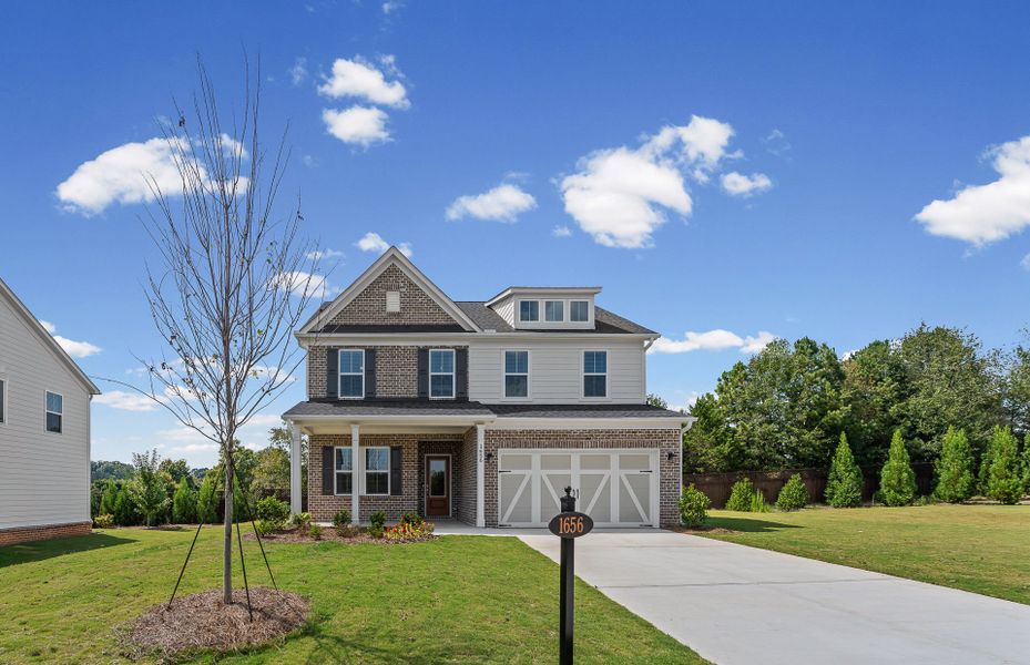 Front exterior of a new home in Berkeley Mill, Cumming, GA, highlighting curb appeal (Image 24).