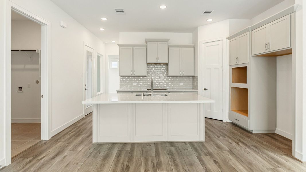 Representative furnished interior of a home built from the Valencia by Brightland Homes in Bridgeland Central, Cypress (Image 9).