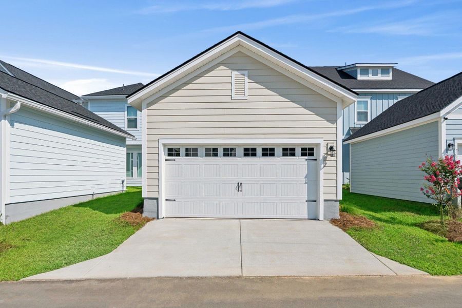 Front exterior of a new home in Nexton - Midtown - The Park Collection, Summerville, SC, highlighting curb appeal (Image 2). Front exterior of a new home in Nexton - Midtown - The Park Collection, Summerville, SC, highlighting curb appeal (Image 2).