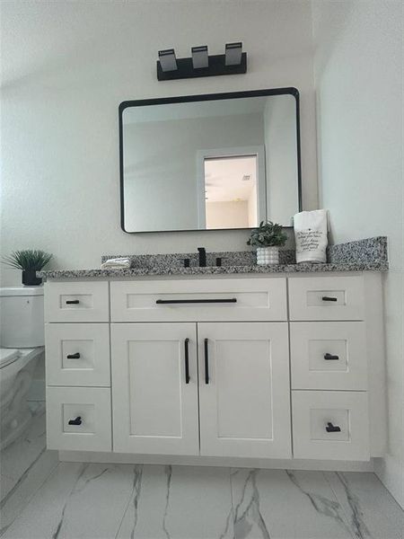 Furnished interior view inside a new home in , North Port (Image 13).