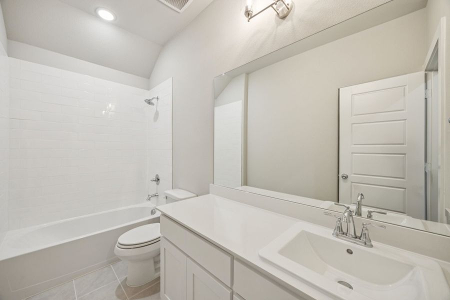Bathroom in the Oscar home plan by Trophy Signature Homes – REPRESENTATIVE PHOTO Bathroom in the Oscar home plan by Trophy Signature Homes – REPRESENTATIVE PHOTO