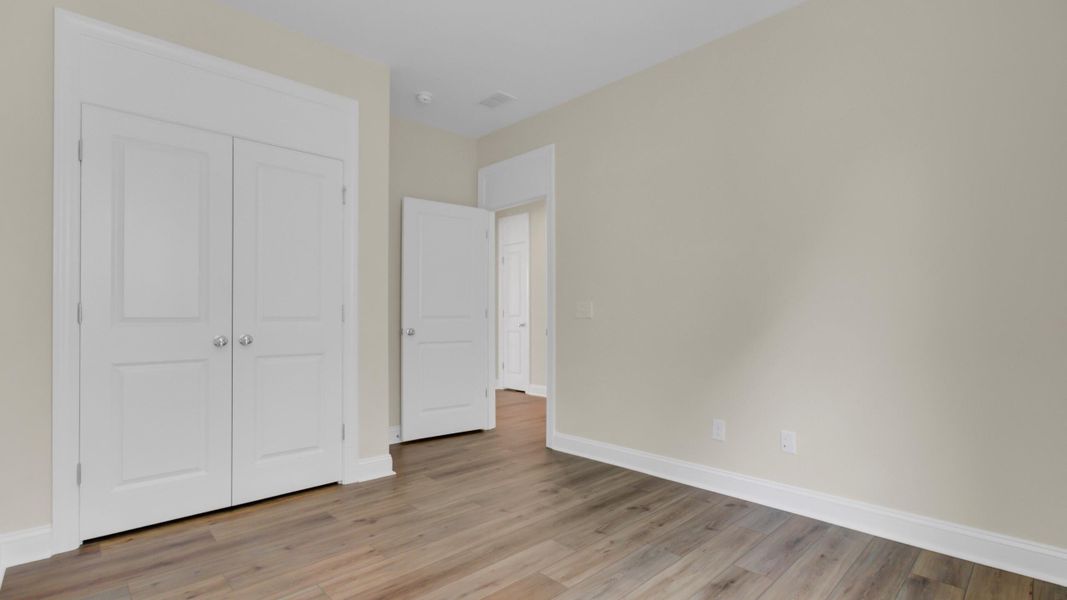 Spacious, unfurnished interior of a new home in Cresswind Charleston, Summerville (Image 28).