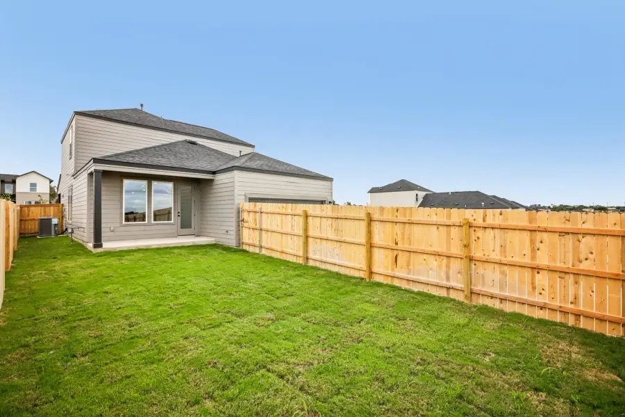 Exterior details and patio area of a home in Parkton Square, Kyle (Image 3).