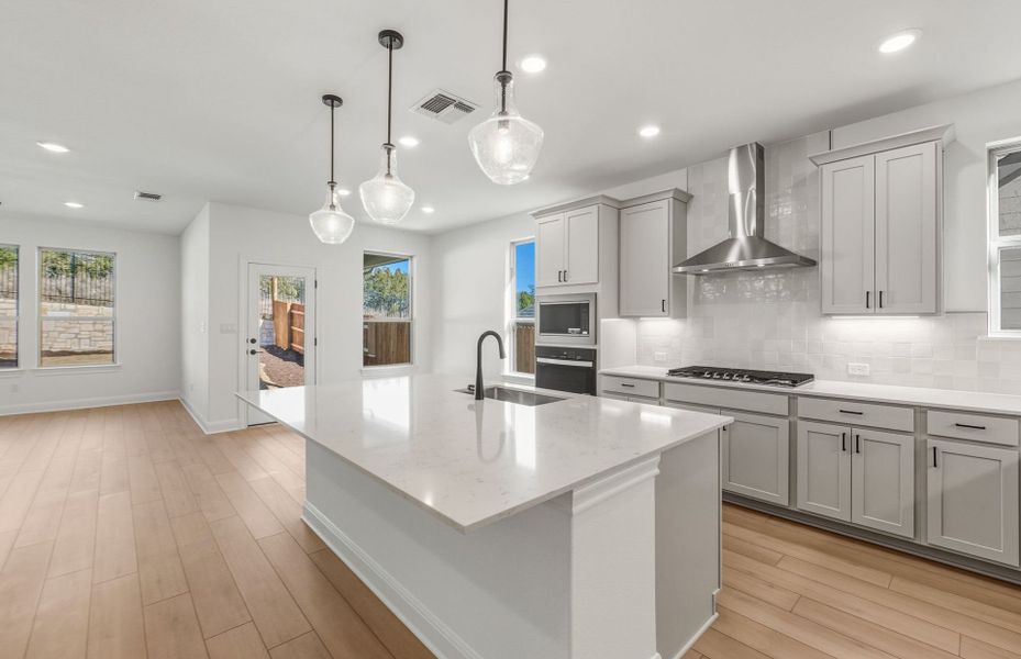 Furnished interior view inside a new home in West Cypress Hills, Spicewood (Image 11).