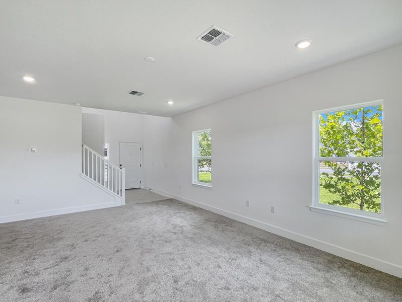 Spacious, unfurnished interior of a new home in Harmony Central, St. Cloud (Image 10).