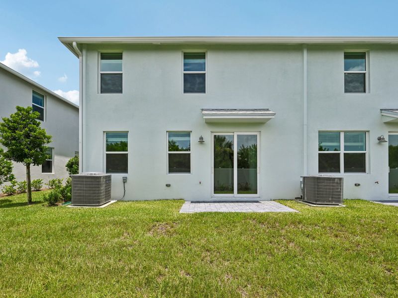 Exterior details and patio area of a home in Tidewater, Fort Pierce (Image 3). Exterior details and patio area of a home in Tidewater, Fort Pierce (Image 3).