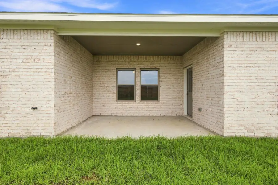 Exterior details and patio area of a home in Windcress, Cove (Image 22).