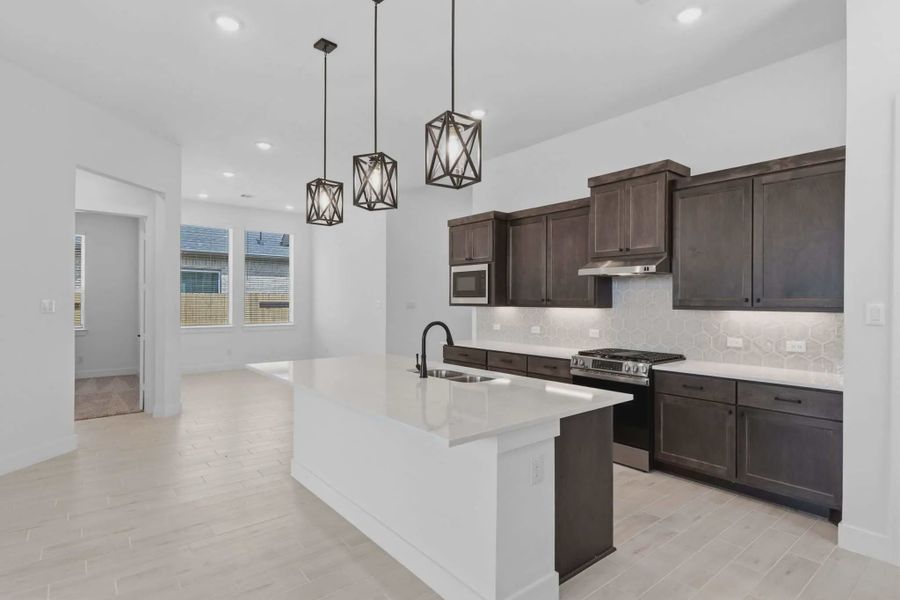 Representative furnished interior of a home built from the Palmer by Chesmar Homes in Riceland Alley Loads, Mont Belvieu (Image 6).