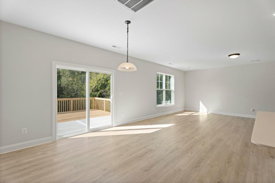 Spacious, unfurnished interior of a new home in Cottages at Piper Village, Trinity (Image 14).