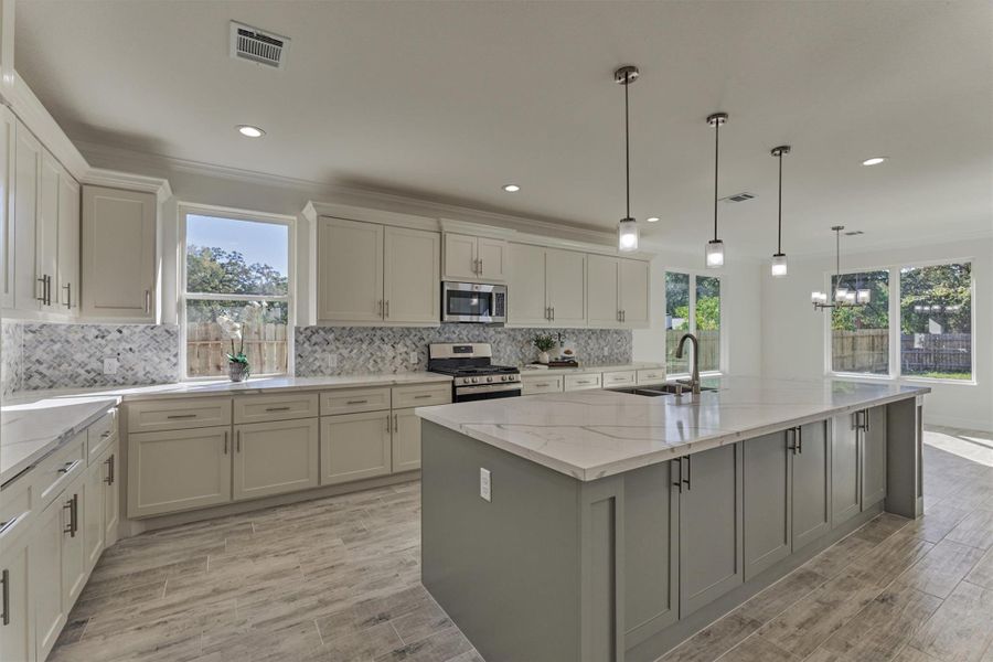 With an abundance of storage and prep space, the chef of the family will absolutely adore the kitchen. With an abundance of storage and prep space, the chef of the family will absolutely adore the kitchen.