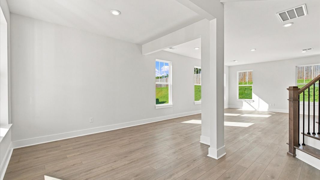 First-class entryway featuring hardwood floors and accomplished architectural style