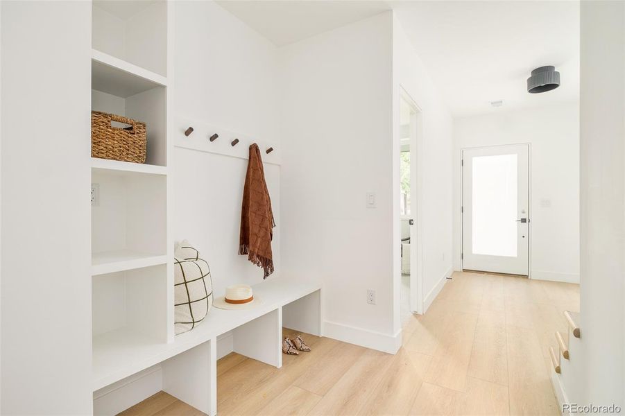 Plenty of storage throughout, including at the custom mudroom built-ins