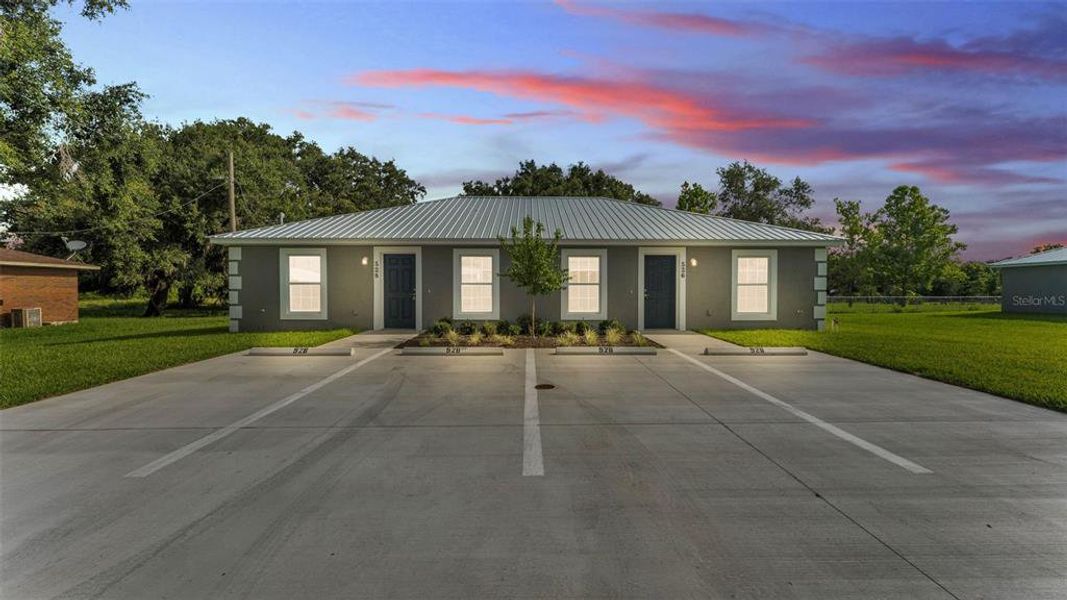 Front exterior of a new home in , Fort Meade, FL, highlighting curb appeal (Image 18).