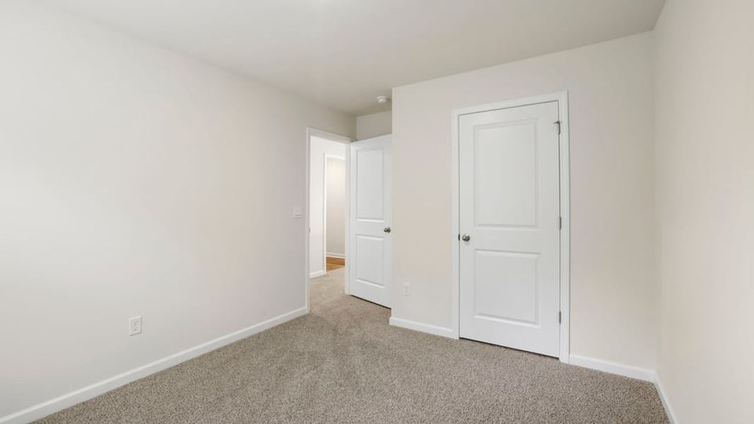 Spacious, unfurnished interior of a new home in Bentley Park, Greenwood (Image 28). Spacious, unfurnished interior of a new home in Bentley Park, Greenwood (Image 28).