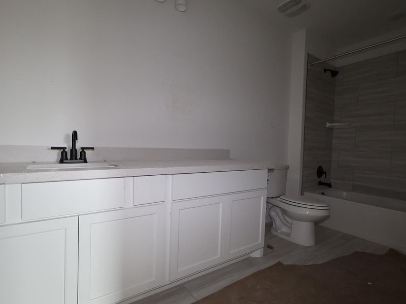 In-progress construction of a new home in Barksdale, Leander, TX (Image 13).